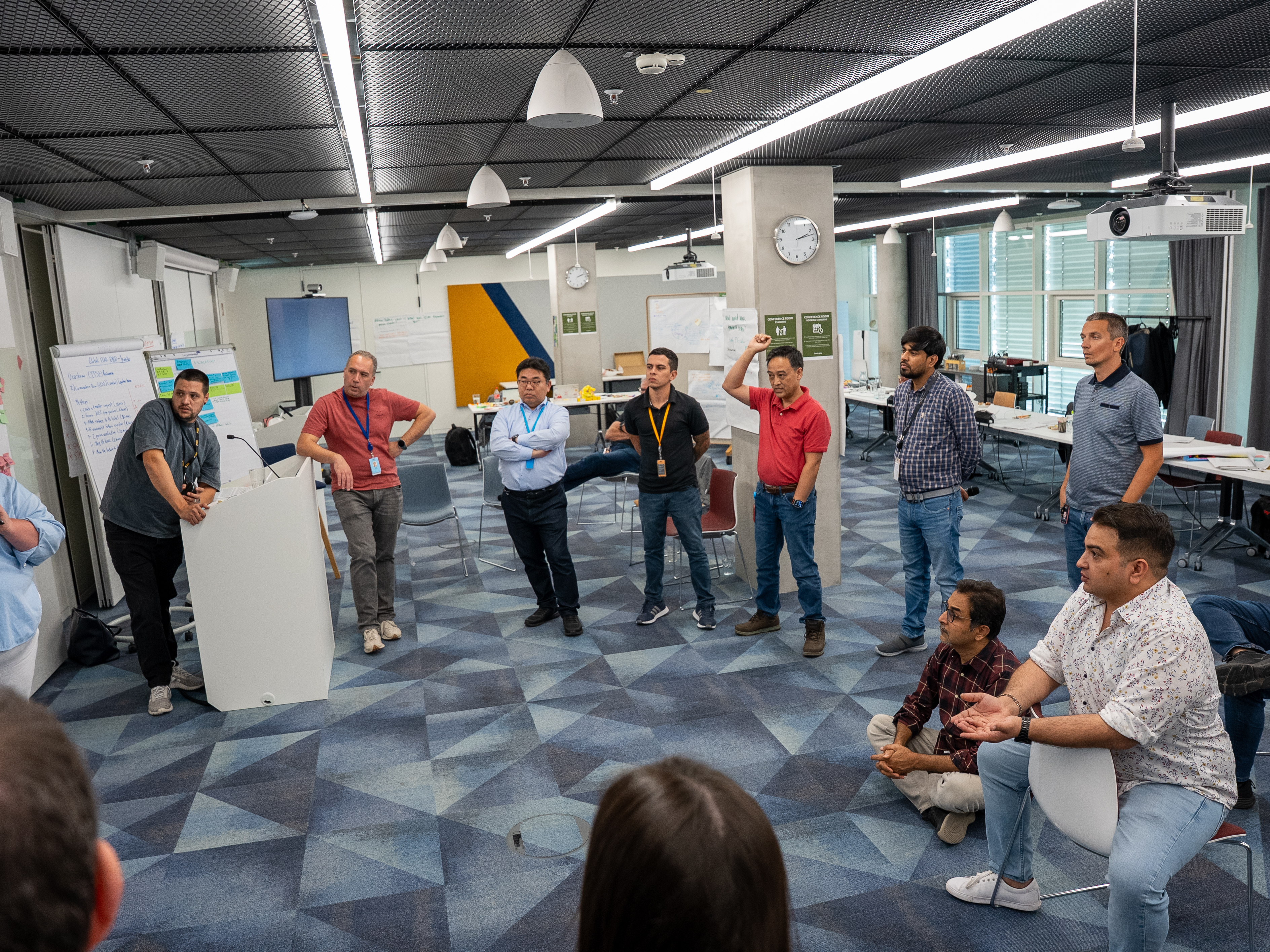 Ash Ahlawat leading an Amazon IT workshop in Munich